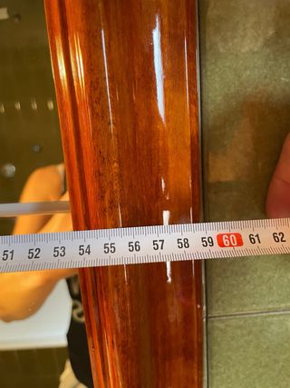 Espejo de baño madera con apliques de luces.