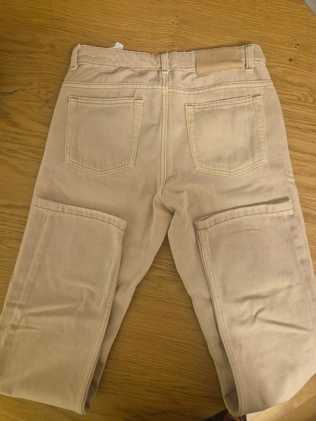 Pantalones beige para niño talla 13-14