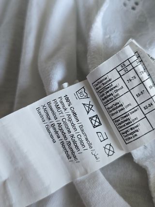 Blusa blanca bordada cuello bardot