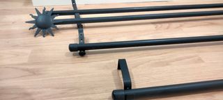 Conjunto de soportes para cortinas de metal