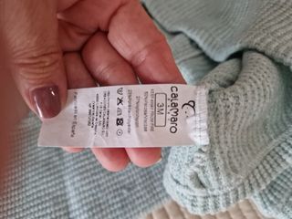 Conjunto de bebé azul con avión