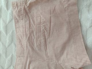 Pantalón corto a rayas con botones