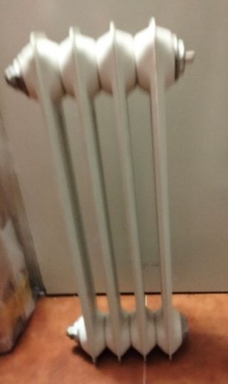 Radiador 4 elementos metal blanco