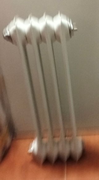 Radiador 4 elementos metal blanco