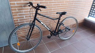 Bicicleta de paseo trekking - todo camino