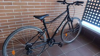 Bicicleta de paseo trekking - todo camino