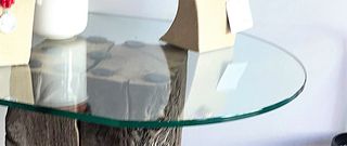 MESA REDONDA DE CRISTAL S/TRAVIESA DE MADERA