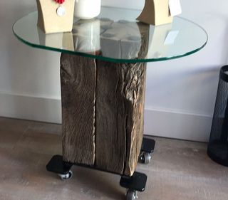 MESA REDONDA DE CRISTAL S/TRAVIESA DE MADERA