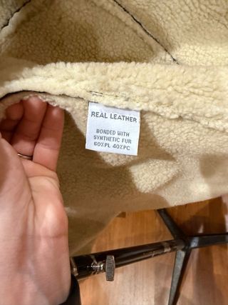 Cappotto lungo nero con interno in pelliccia