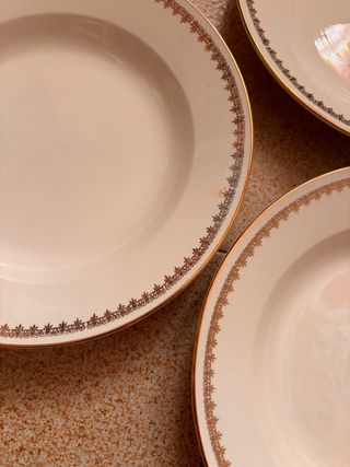 Set piatti oro e bianco