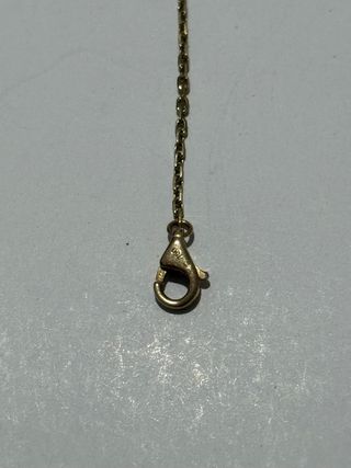 Cartier Amulette en oro y diamante