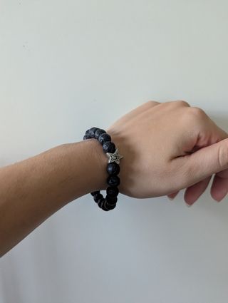 Braccialetto pietre nere con ciondolo stella