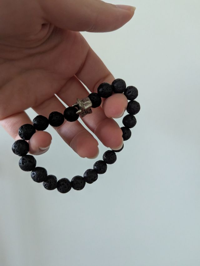 Braccialetto pietre nere con ciondolo stella