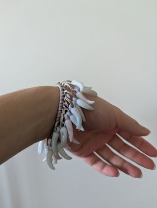 Braccialetto portafortuna con cornetti pendenti