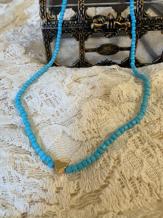 Collana blu con cuore in oro