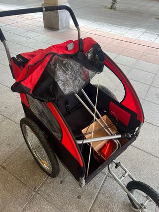 Carro porta bebés para bicicleta