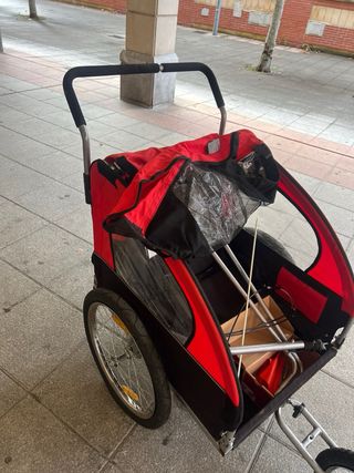 Carro porta bebés para bicicleta