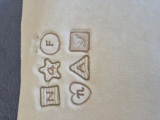 Manta cuna Naf Naf beige