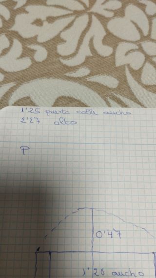 Portón y puerta de entrada forjados