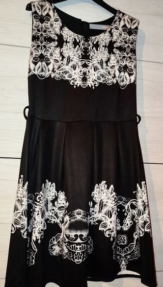 Vestito nero con fantasia bianca