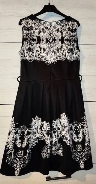 Vestito nero con fantasia bianca