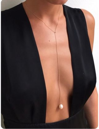 Gargantilla dorada con perla