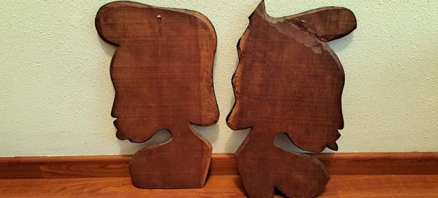 Figuras, elegantes rostros de madera.