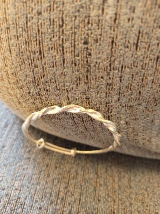 Pulsera plateada trenzada ajustable