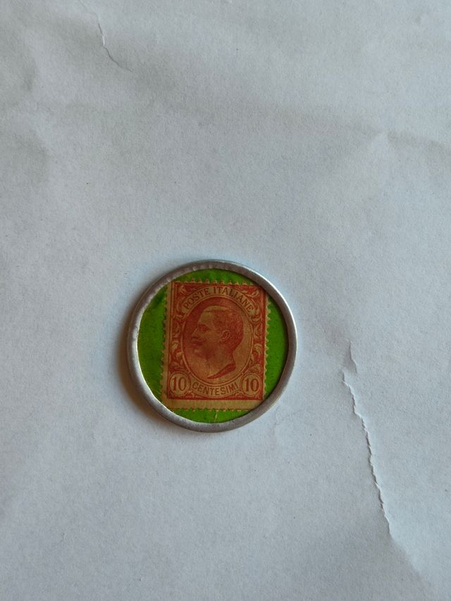 Gettone pubblicitario con francobollo