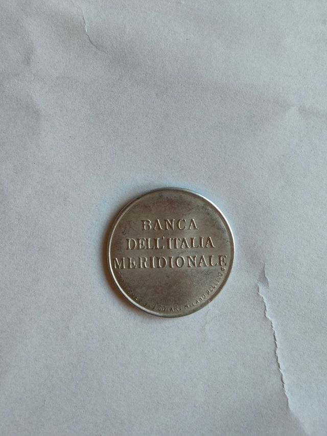 Gettone pubblicitario con francobollo