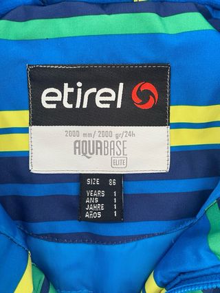 Tuta da neve bambino a righe blu, verdi e gialle