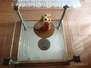 Mesa de centro cristal y metal dorado