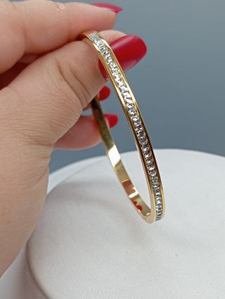 Pulsera rígida acero,baño de oro y circonitas