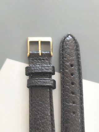 Correa de piel para reloj - Negra y dorada nueva.