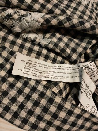 Zara a estrenar busa a cuadros con bordado