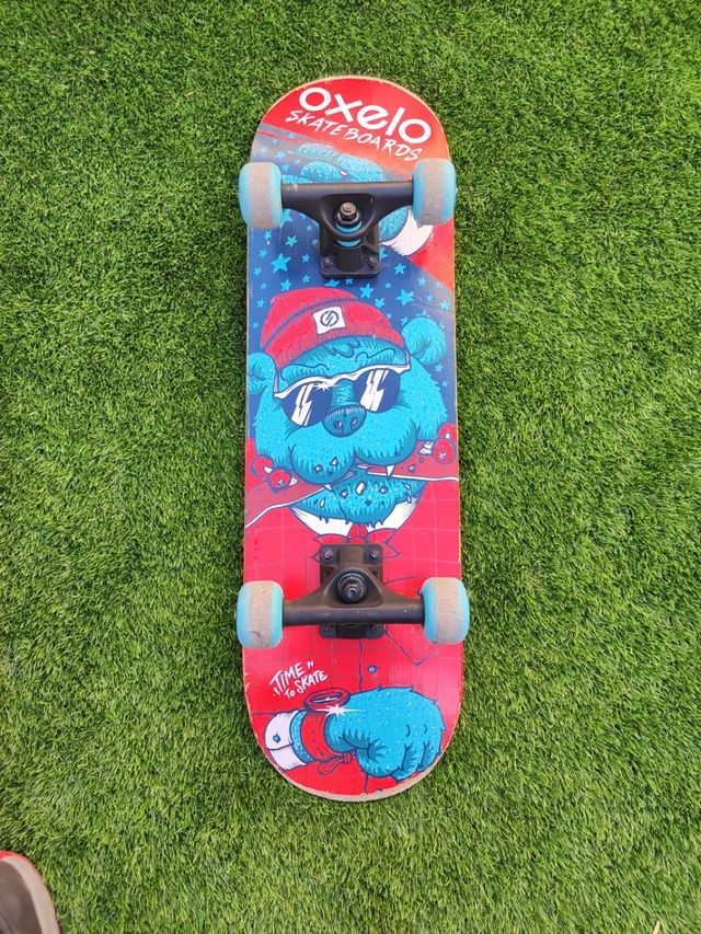 Monopatín Oxelo con diseño de oso