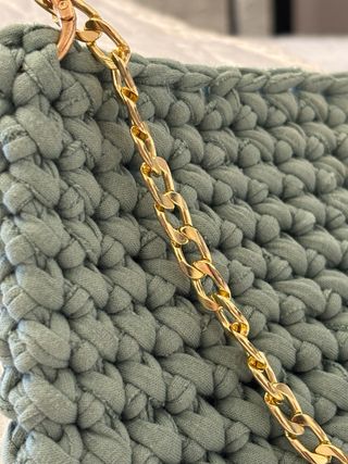 borsetta pochette a busta con catenella a spalla