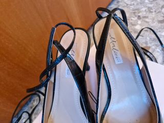 Tacchi slingback alla schiava neri
