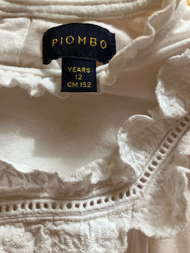 Camicetta bianca con rouches