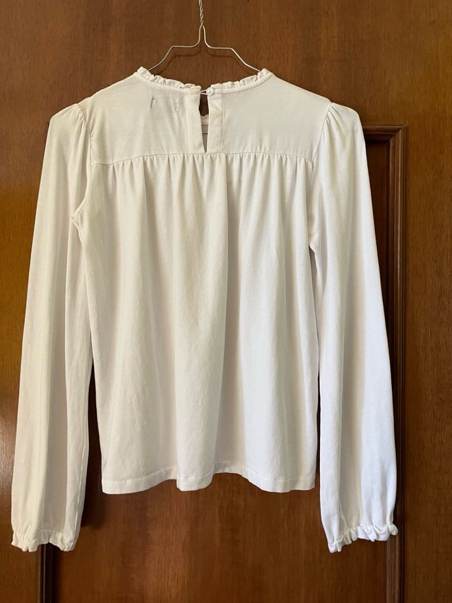 Camicetta bianca con rouches