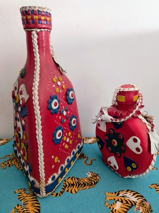 Coppia bottiglia e borraccia in pelle rossa