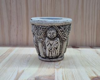 Portacandele in resina con candela decorativa