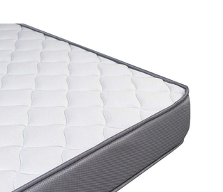 Colchón de tela gris y blanco