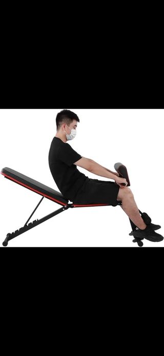 Banco de pesas plegable con mancuernas