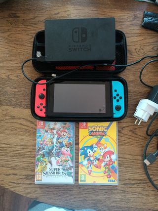 Nintendo Switch con juegos, funda y mando