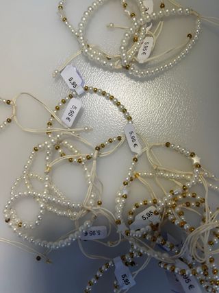 Pulsera de perlas y estrellas