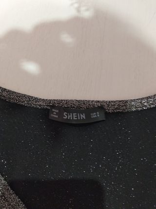 Jersey brillante plateado y negro,no hago envios