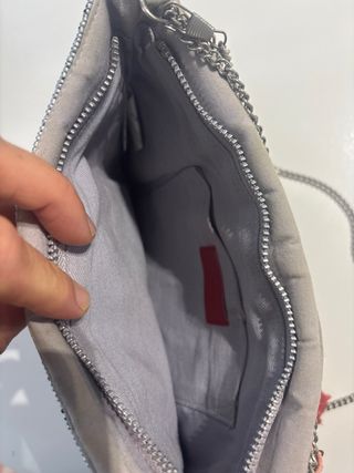 Bolso joya gris con abalorios y flecos