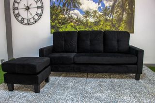 Sofá cama gris de tela