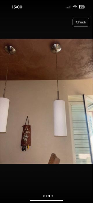 Luci d'arredamento in vetro e metallo